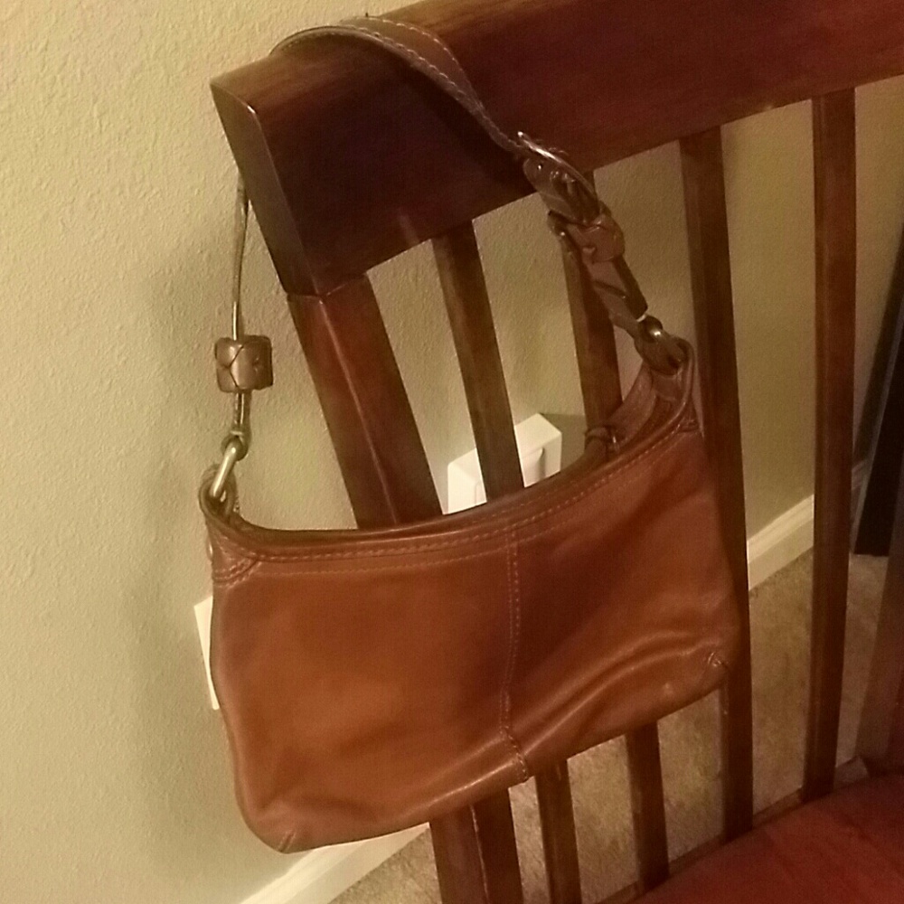 Brown leather Coach